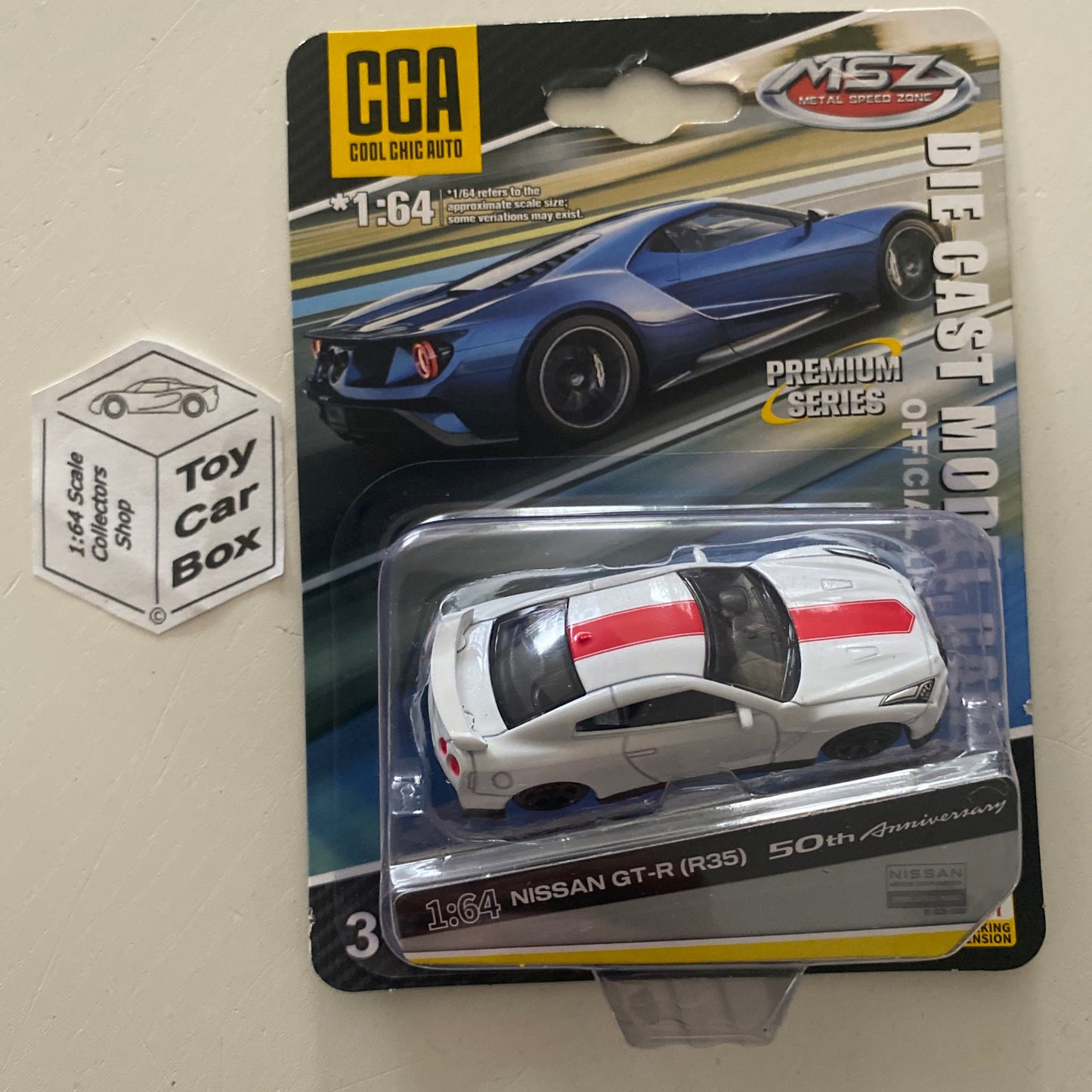 MSZ / CCA - Nissan GT-R 50th Anniversary (White - 1/64 Scale) & Display Box -E90