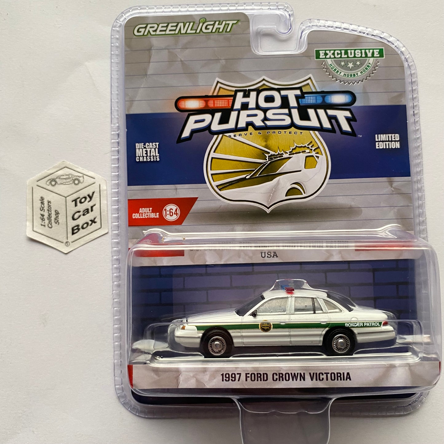 GREENLIGHT - 1997 Ford Crown Victoria (US Customs & Border Hobby Exclusive) J45g