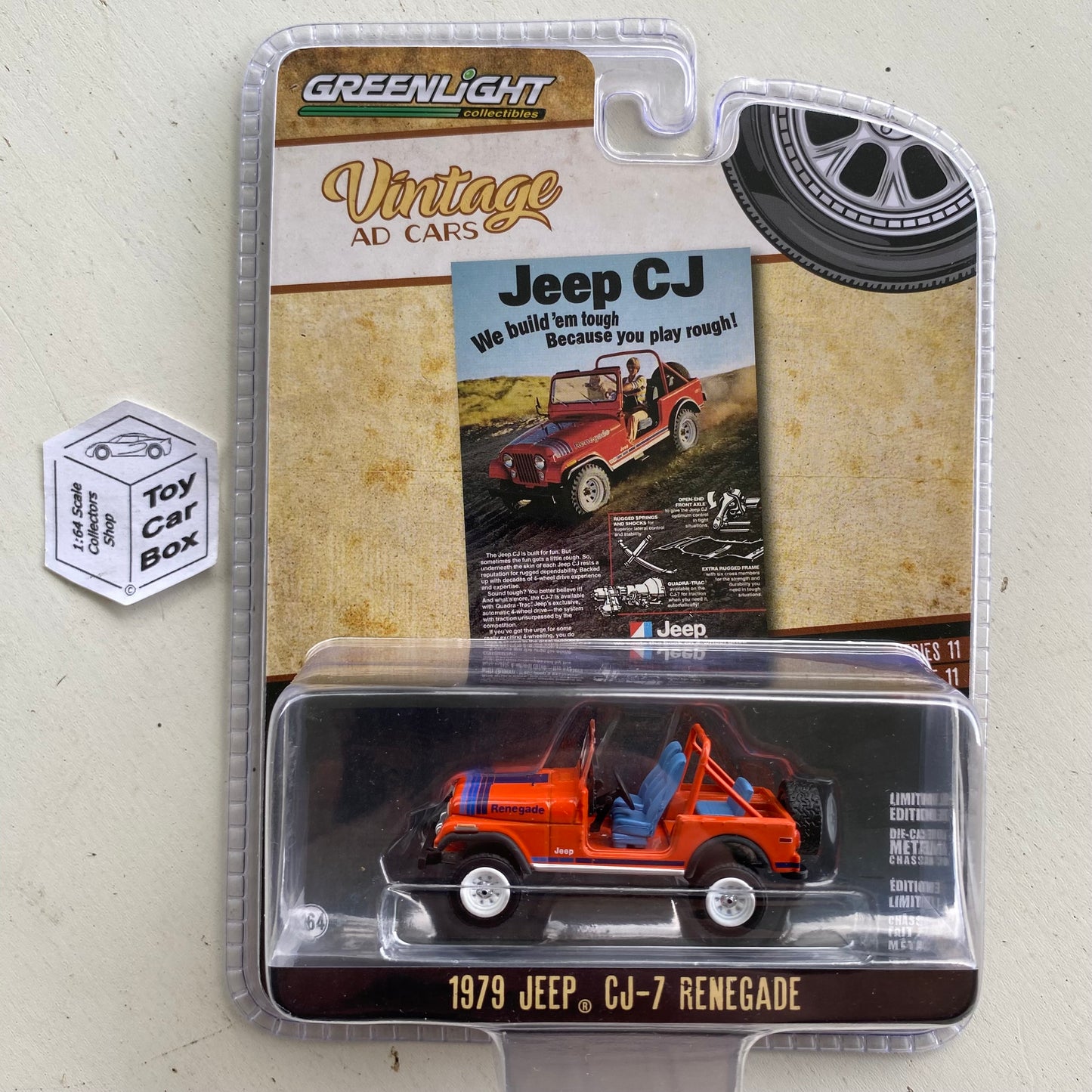 GREENLIGHT - 1979 Jeep CJ-7 Renegade (Orange - Vintage Ad Cars Series 11) I80g