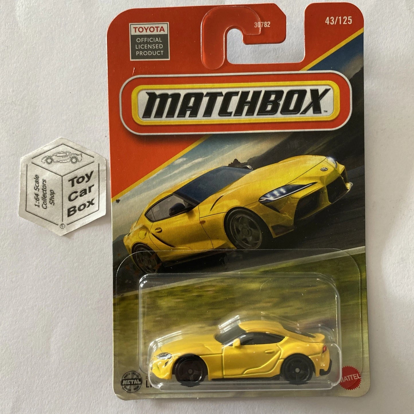 2025 MATCHBOX #43 - 2023 Toyota GR Supra (Long Card - Yellow) B64