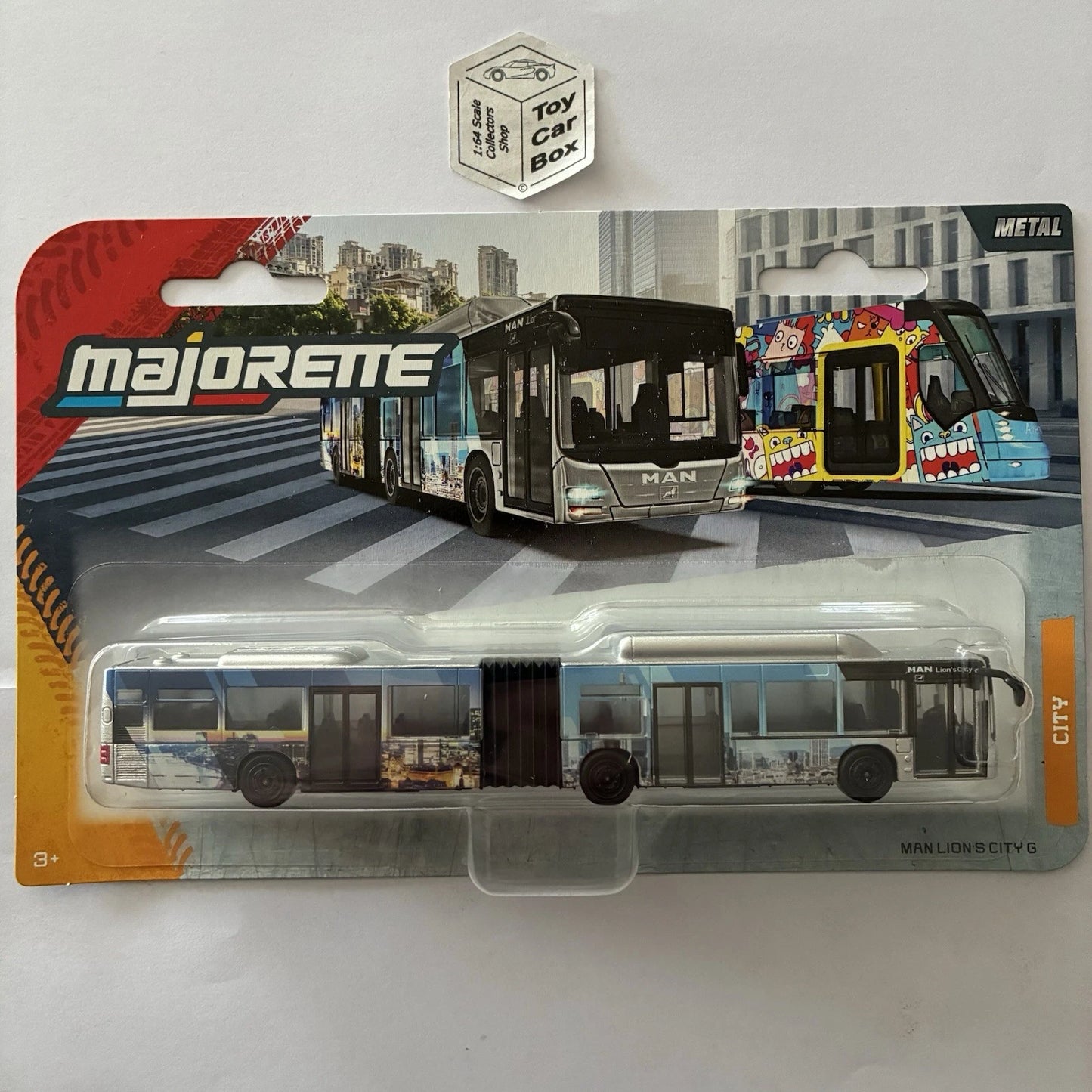 MAJORETTE - MAN Lion S City G Articulated Bus (Silver - City Skyline Design) K53