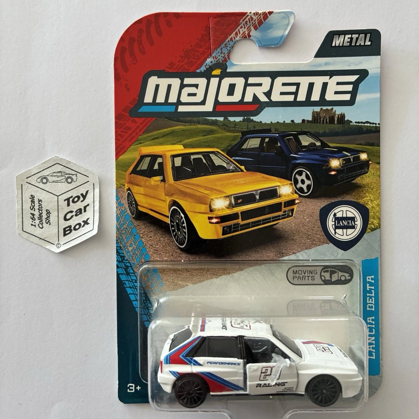 MAJORETTE - Lancia Delta Integrale (White ‘#29 Racing’ - 1:64* Premium Car) E64