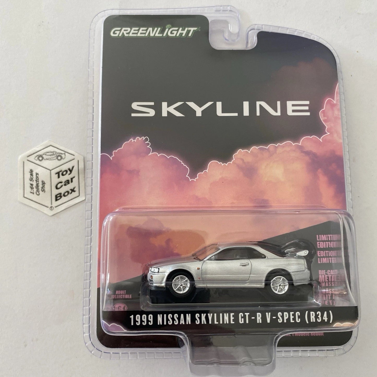 GREENLIGHT - 1999 Nissan Skyline GT-R V-Spec R34 (Silver - Limited Edition) I80g