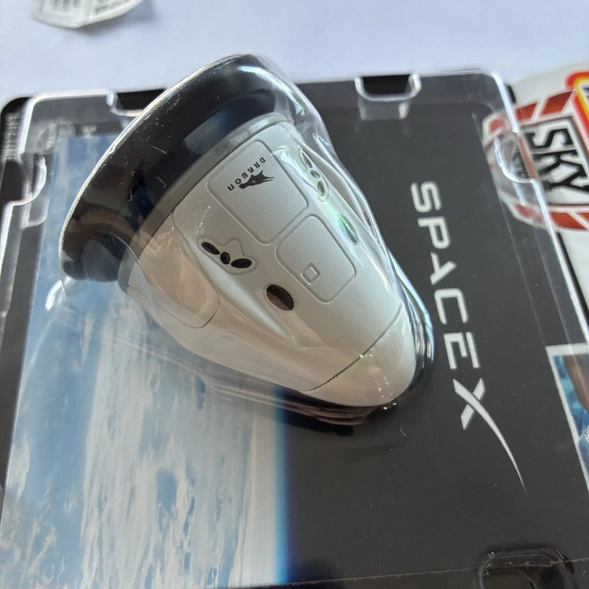 2024 MATCHBOX Sky Busters #22 - SpaceX Dragon Spacecraft (White - Unopened) D02g