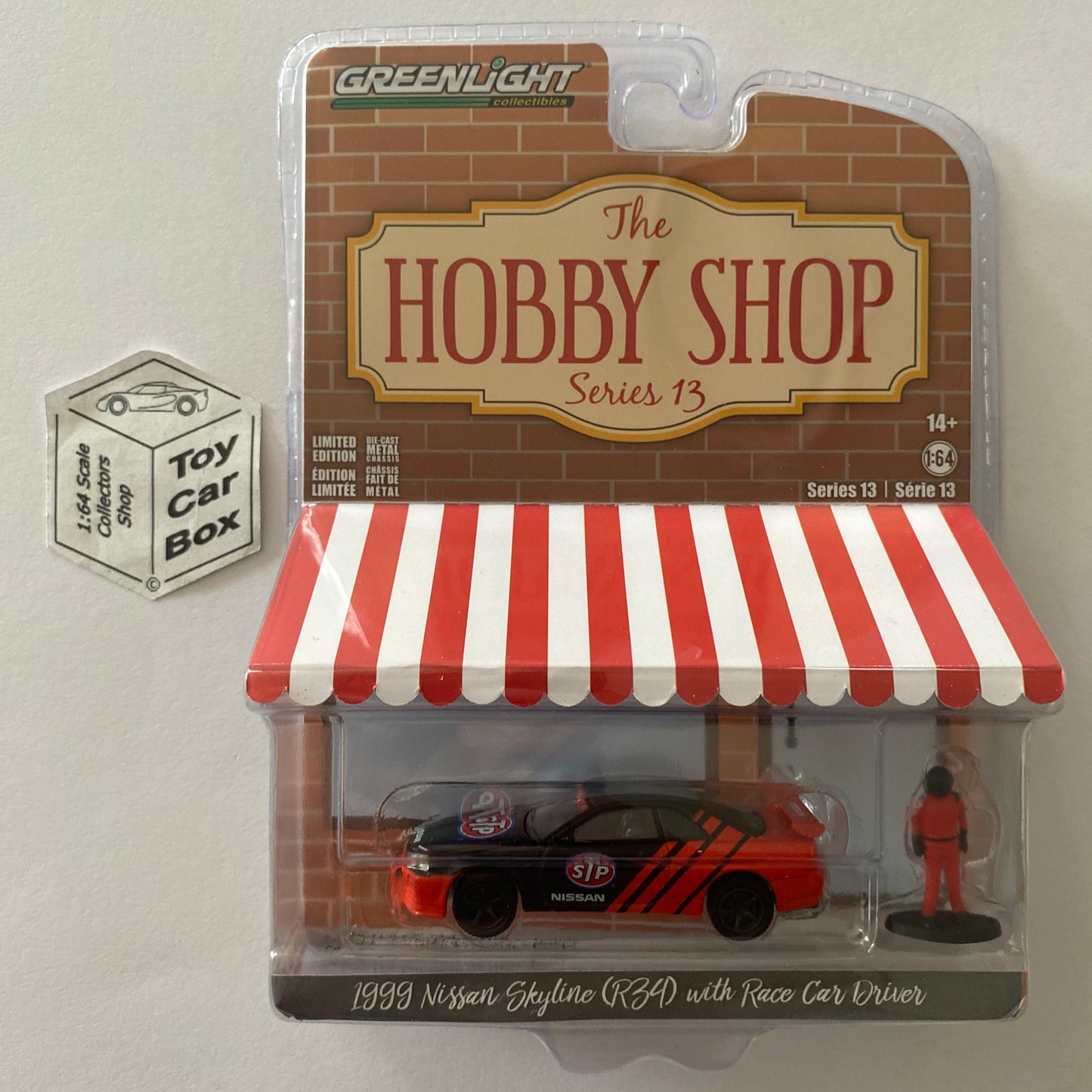 GREENLIGHT - 1999 Nissan Skyline R34 GT-R (STP - Hobby Shop Series 13) I99g