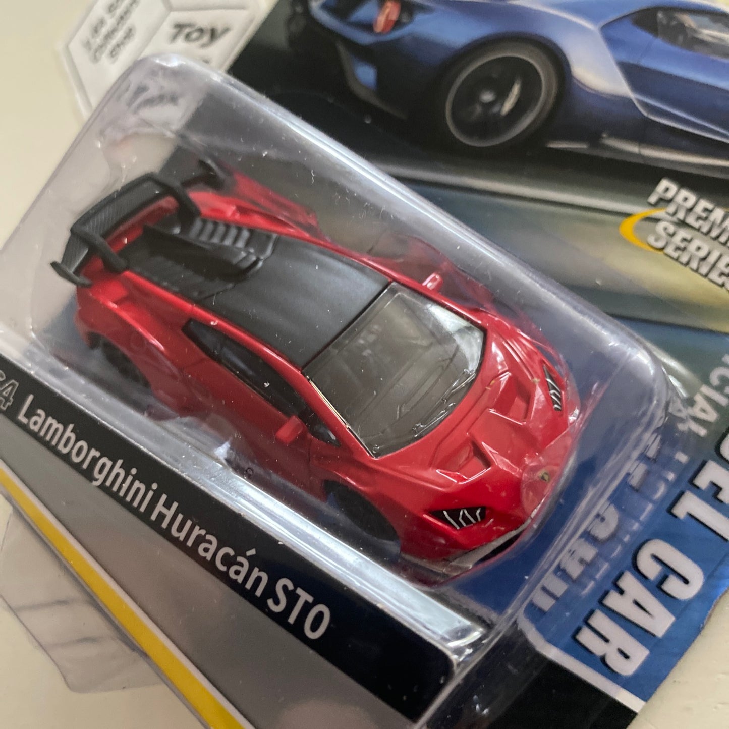 MSZ / CCA - Lamborghini Huracan STO (Red - 1/64 Scale) & Display Box - E90