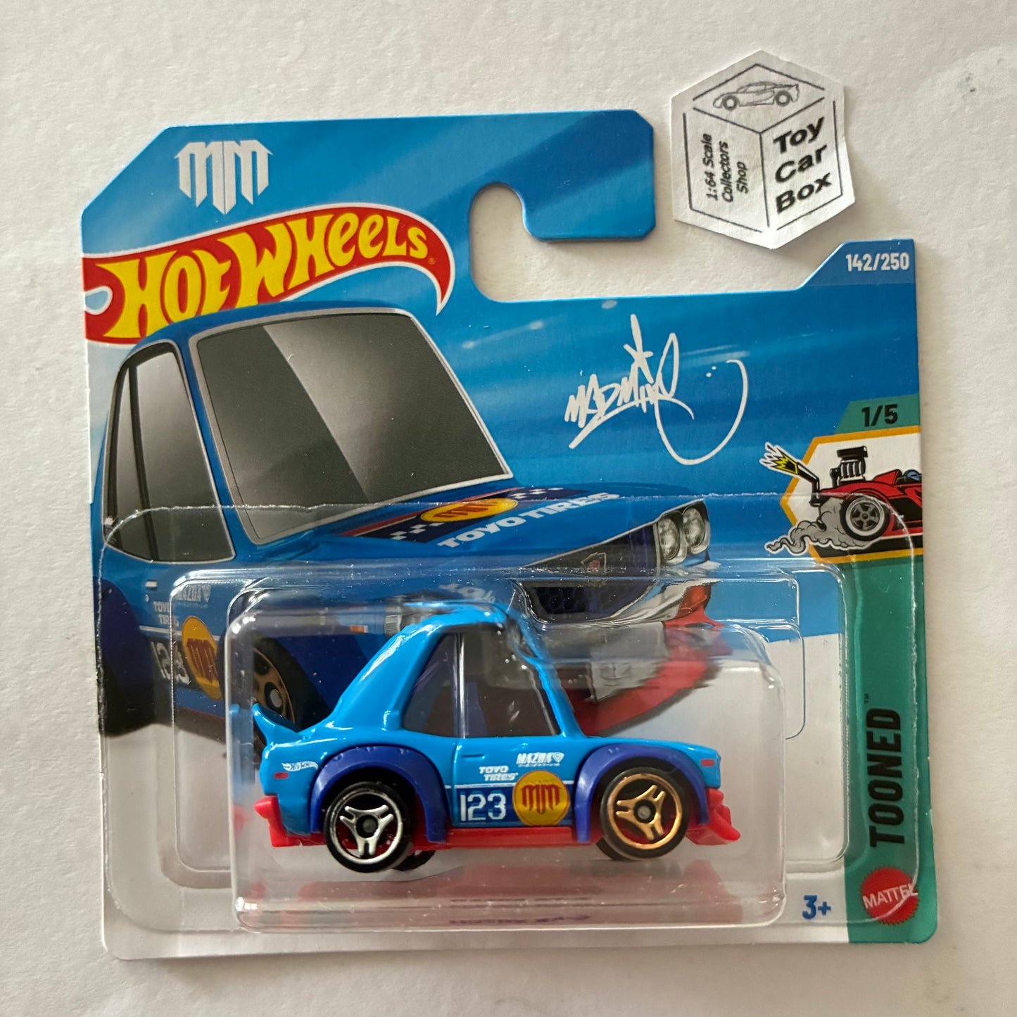2026 HOT WHEELS #142 - Mazda RX-3 (Blue Mad Mike #1 Tooned - Short Card) B46g