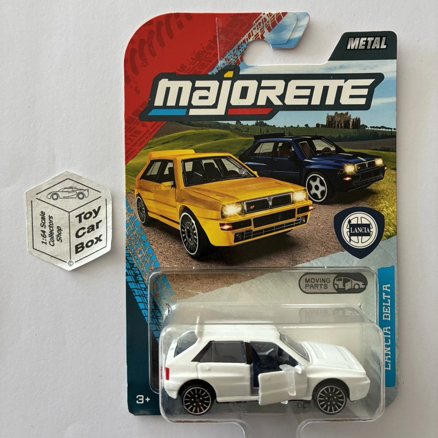 MAJORETTE - Lancia Delta Integrale (White - 1:64* Premium - Opening Doors) E64