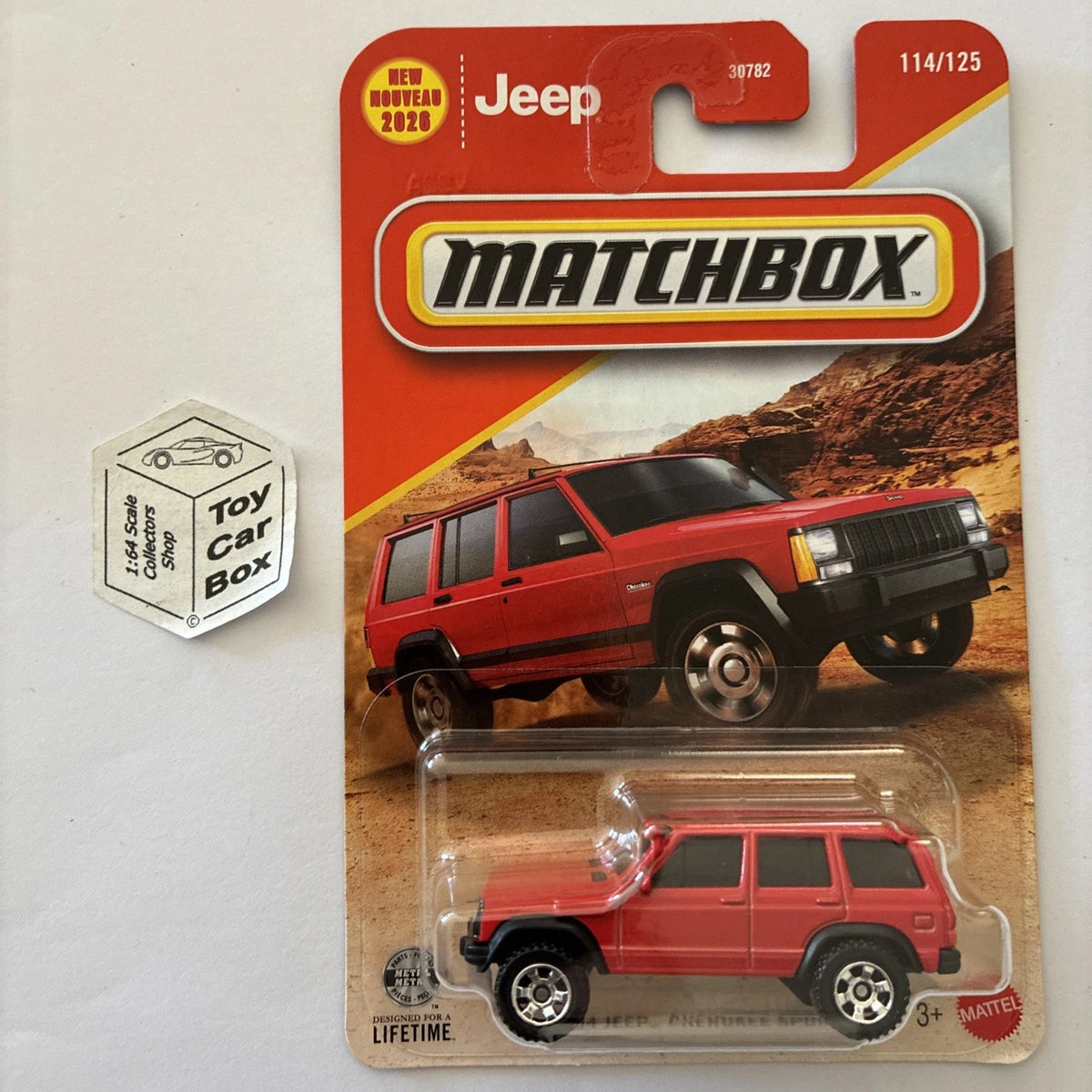 2026 MATCHBOX #114 - 1994 Jeep Cherokee Sport (Red - Long Card - Unopened) C00