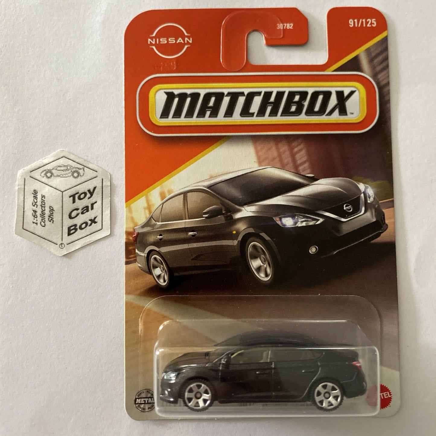 2025 MATCHBOX #91 - 2016 Nissan Sentra (Black - Long Card) B59