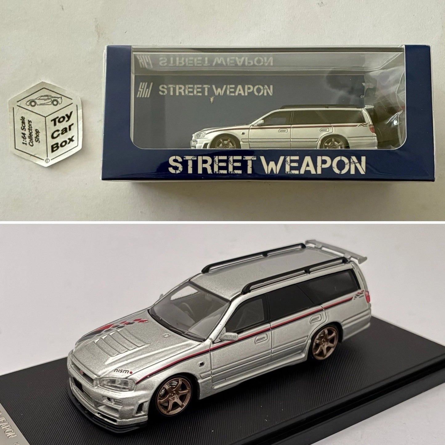 STREET WEAPON - Nissan Stagea R34 Wagon (Silver - 1/64 Scale Display Case) V13g