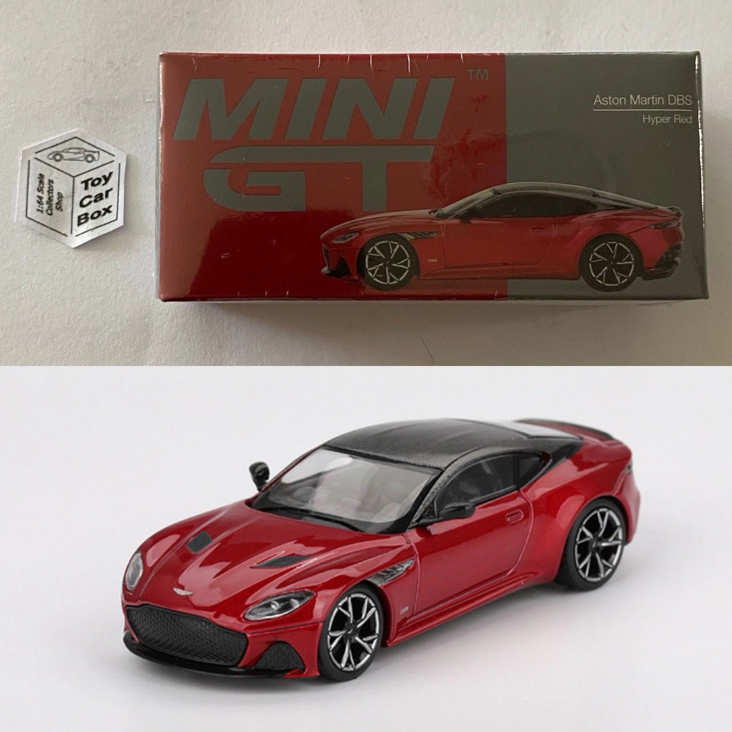 Mini GT #1065 - Aston Martin DBS (Hyper Red - 1/64 Scale - Sealed Box) N38g