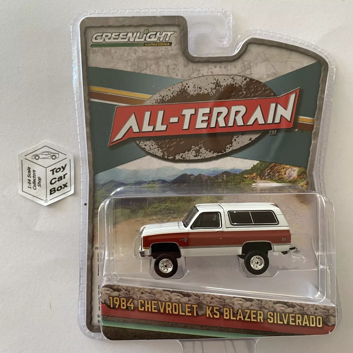 GREENLIGHT - 1984 Chevy K5 Blazer Silverado (White - All Terrain Series 16) I84g