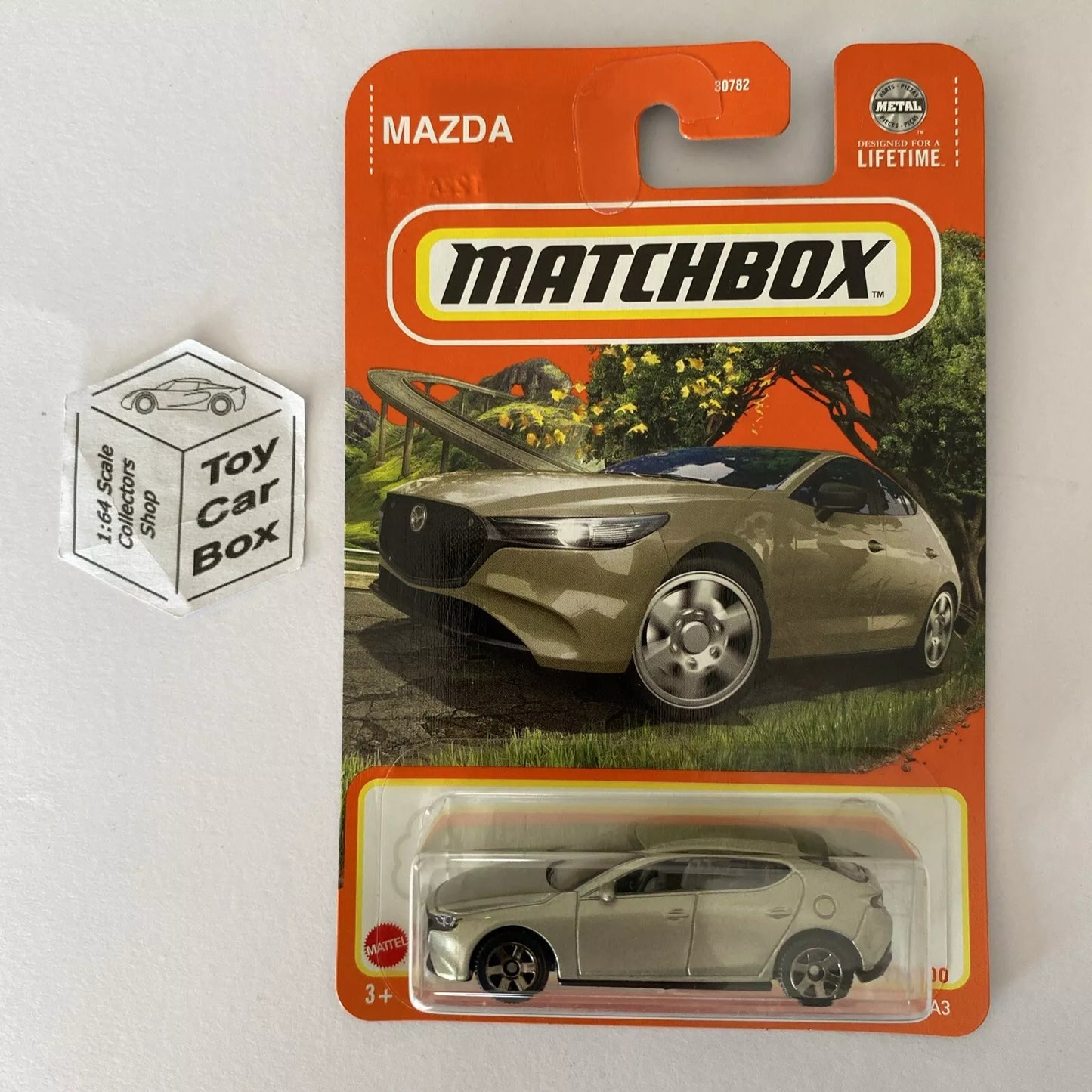 2024 MATCHBOX #77 - 2019 Mazda 3 (Champagne - Long Card ) B00