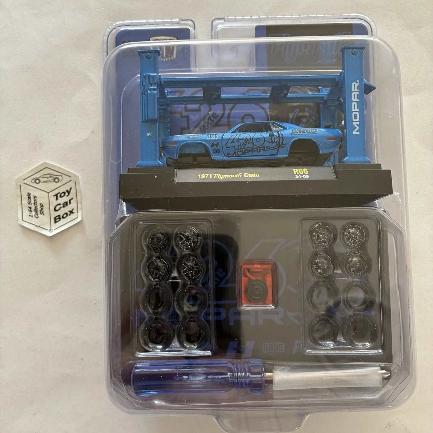 M2 MACHINES - 1971 Plymouth Cuda (Blue - 1:64 Model Kit R66) O53g