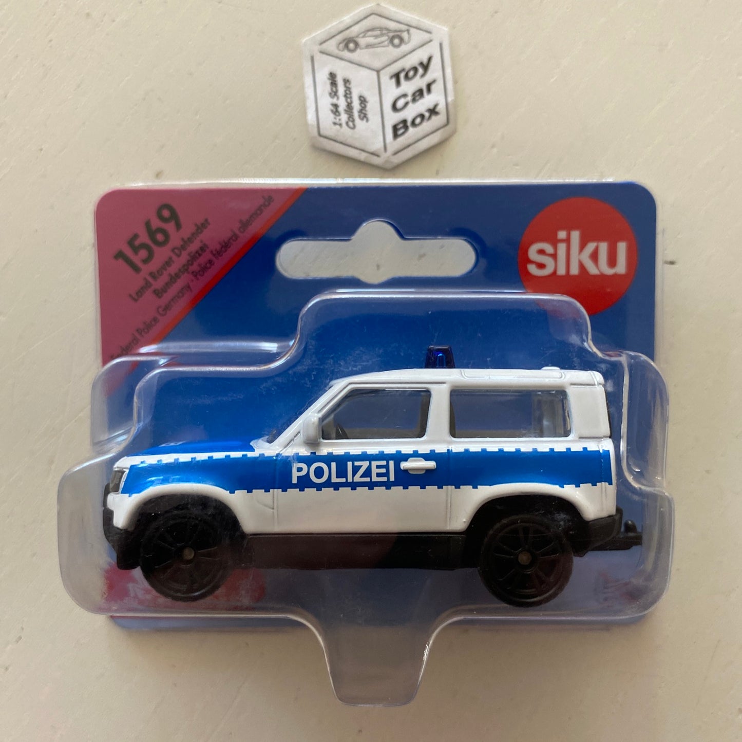 SIKU #1548 - Land Rover Defender 90 (White Polizei - Approx. 1:63 scale) E50