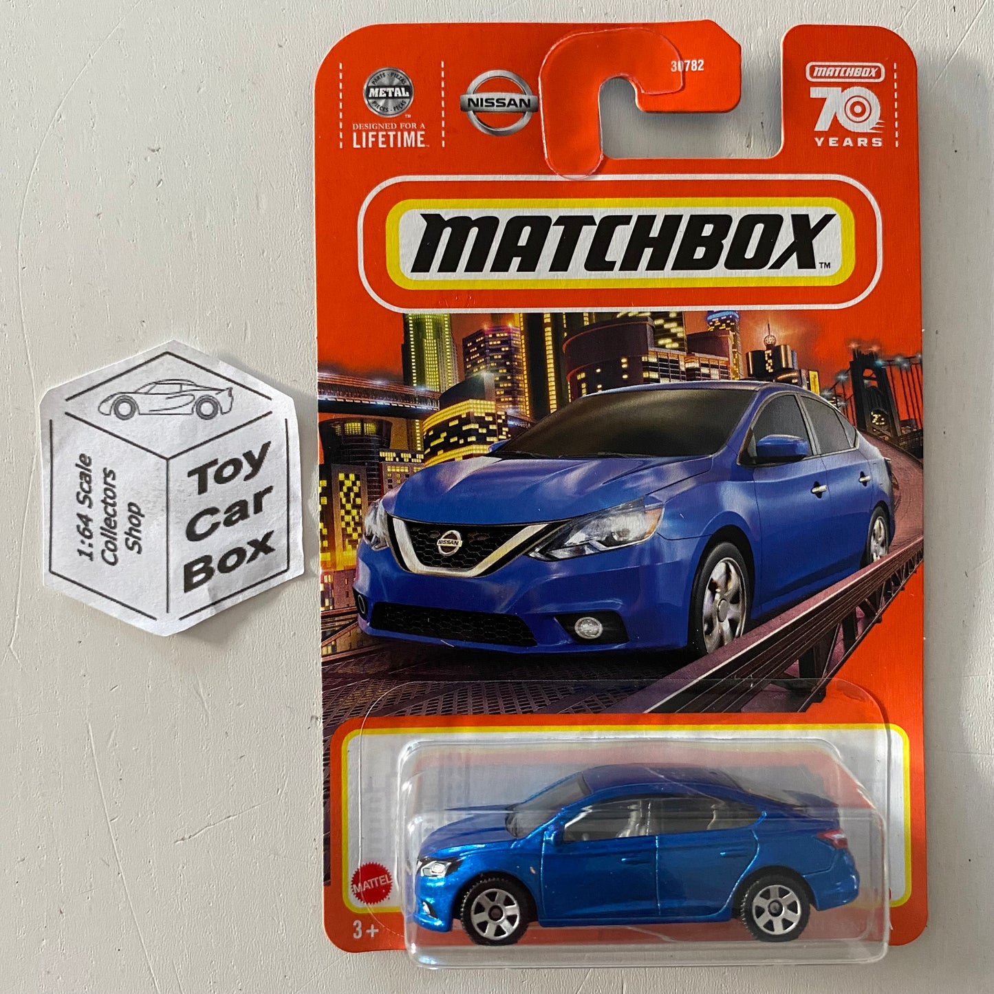 2023 MATCHBOX #70 - 2016 Nissan Sentra (Blue - Long Card) New - B92