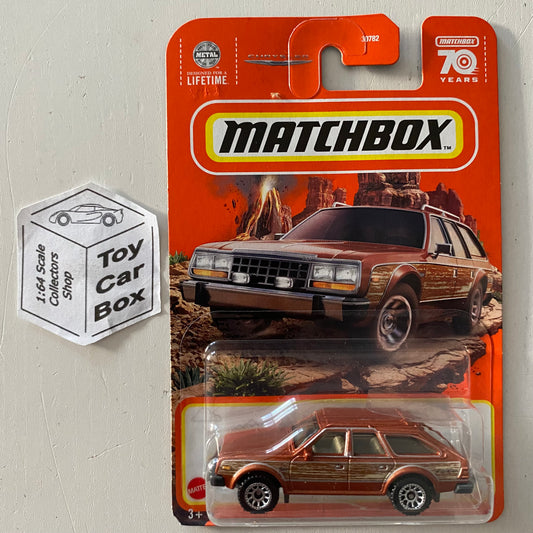2023 MATCHBOX #11 - 1980 AMC Eagle (Brown - Long Card) New - B92